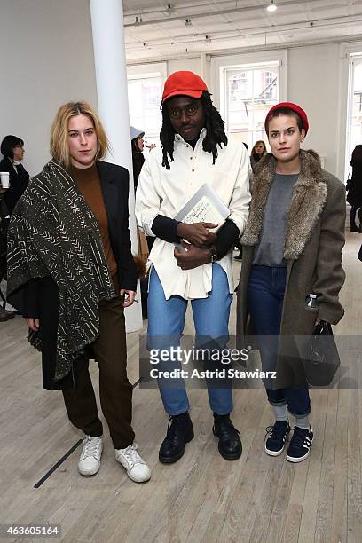 Scout Willis, musician Devonte "Dev" Hynes and Tallulah Willis attend Eckhaus Latta -Front Row during MADE Fashion Week Fall 2015 on February 16,...