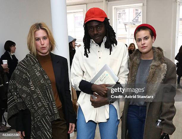 Scout Willis, musician Devonte "Dev" Hynes and Tallulah Willis attend Eckhaus Latta -Front Row during MADE Fashion Week Fall 2015 on February 16,...