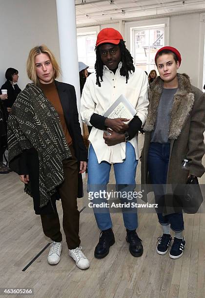 Scout Willis, musician Devonte "Dev" Hynes and Tallulah Willis attend Eckhaus Latta -Front Row during MADE Fashion Week Fall 2015 on February 16,...