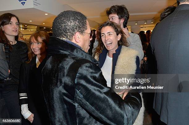 Joey Starr and Mademoiselle Agnes attend the 'Phantom, L'Implosive Sound Center De Devialet' cocktail launch at Colette on February 16, 2015 in...