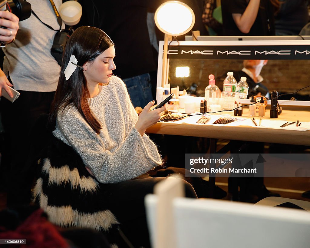 Kendall Jenner prepares backstage for Donna Karan New York Runway on