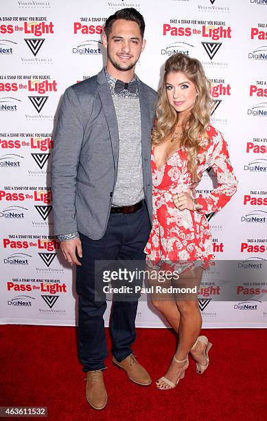Tyler Beede and Allie DeBerry arriving at the premiere of "Pass The Light" at ArcLight Cinemas on February 2, 2015 in Hollywood, California.