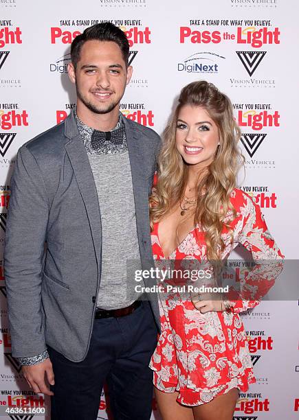 Tyler Beede and Allie DeBerry arriving at the premiere of "Pass The Light" at ArcLight Cinemas on February 2, 2015 in Hollywood, California.