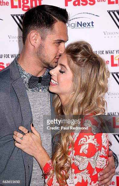 Tyler Beede and Allie DeBerry arriving at the premiere of "Pass The Light" at ArcLight Cinemas on February 2, 2015 in Hollywood, California.
