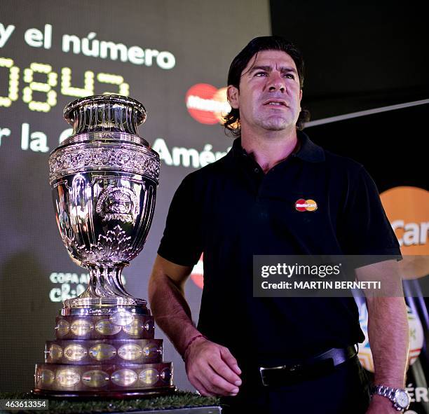 Chilean former football player Marcelo Salas poses with the trophy of the Copa America Chile 2015 during the Trophy Tour in Antofagasta, Chile on...