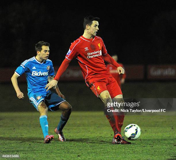 Jordan Williams of Liverpool and Carl Lawson of Sunderland in action during the Barclays U21 Premier League match between Liverpool and Sunderland at...
