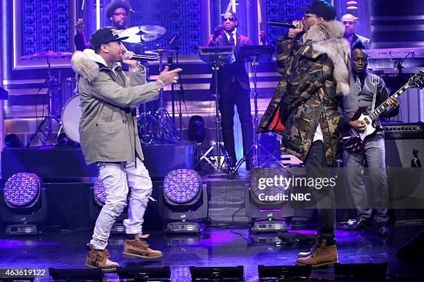 Episode 0211 -- Pictured: Musical guests Tyga and Chris Brown perform with The Roots on February 16, 2015 --