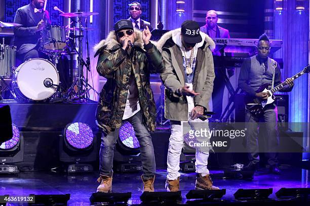 Episode 0211 -- Pictured: Musical guests Chris Brown and Tyga perform with The Roots on February 16, 2015 --