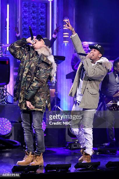 Episode 0211 -- Pictured: Musical guests Chris Brown and Tyga perform with The Roots on February 16, 2015 --