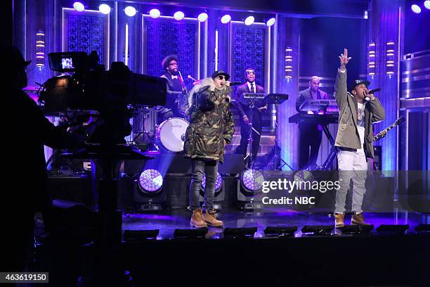 Episode 0211 -- Pictured: Musical guests Chris Brown and Tyga perform with The Roots on February 16, 2015 --