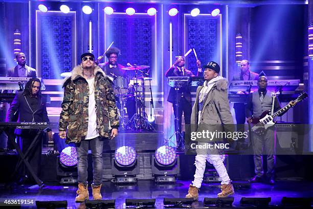 Episode 0211 -- Pictured: Musical guests Chris Brown and Tyga perform with The Roots on February 16, 2015 --