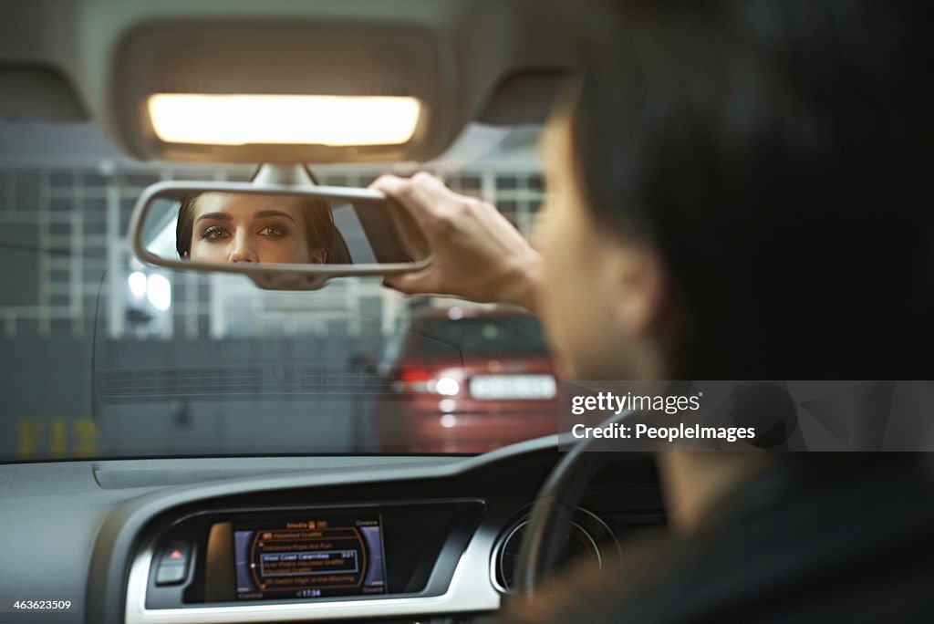 Checking her reflection