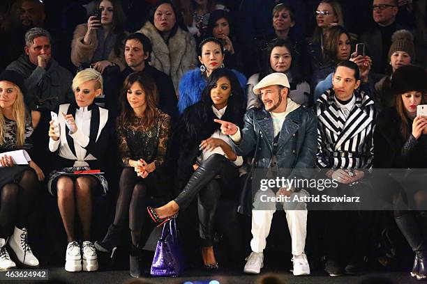 Stephanie Szostak, Porsha Stewart and Phillip Bloch attend the Vivienne Tam fashion show during Mercedes-Benz Fashion Week Fall 2015 at The Theatre...