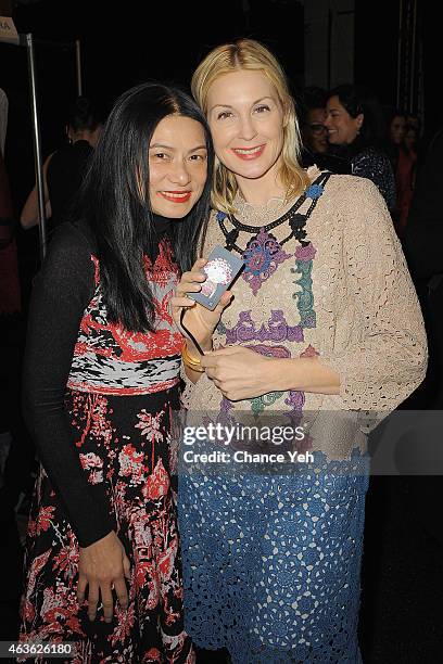 Designer Vivienne Tam and actress Kelly Rutherford attend the Vivienne Tam Fashion Show during Mercedes-Benz Fashion Week Fall 2015 at The Theatre at...