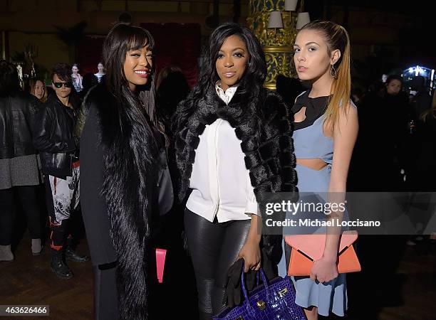 Lauren Williams, Porsha Williams and a guest pose backstage at the alice + olivia by Stacey Bendet fashion show during Mercedes-Benz Fashion Week...