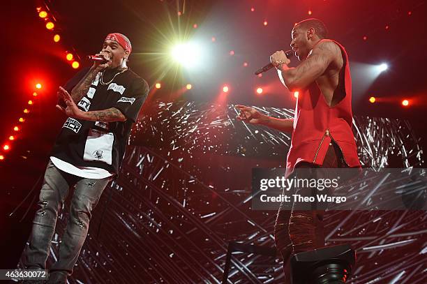 Chris Brown and Trey Songz perform onstage during the "Between The Sheets" tour at Barclays Center of Brooklyn on February 16, 2015 in New York City.