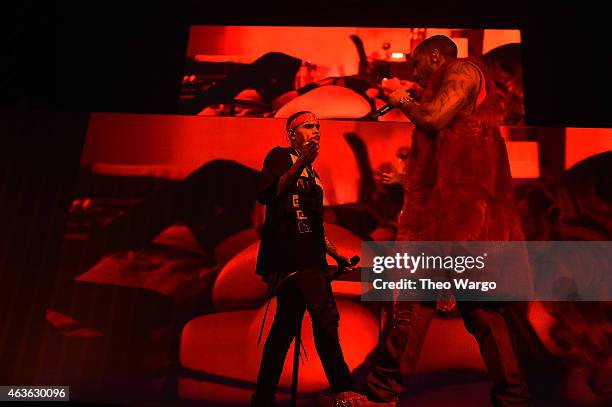 Chris Brown and Trey Songz perform onstage during the "Between The Sheets" tour at Barclays Center of Brooklyn on February 16, 2015 in New York City.