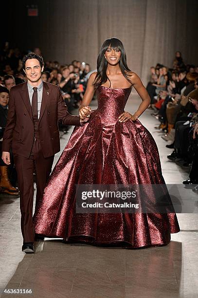 Fashion designer Zac Posen walks the runway with Supermodel Naomi Campbell at the Zac Posen Autumn Winter 2015 fashion show during New York Fashion...