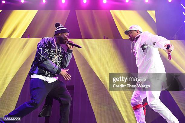 Cent and Chris Brown perform onstage during the "Between The Sheets" tour at Barclays Center of Brooklyn on February 16, 2015 in New York City.