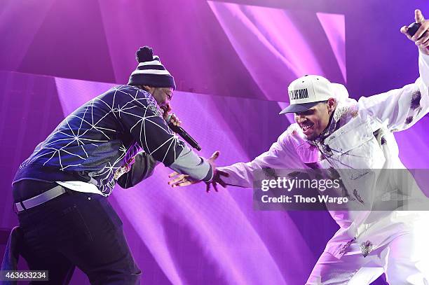 Cent and Chris Brown perform onstage during the "Between The Sheets" tour at Barclays Center of Brooklyn on February 16, 2015 in New York City.