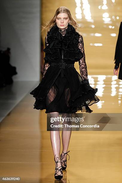 Model walks the runway at the Reem Acra during Mercedes-Benz Fshion Week at The Salon at Lincoln Center on February 16, 2015 in New York City.