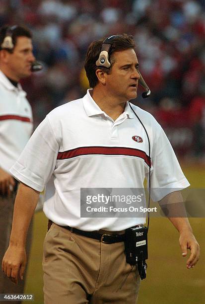 Head coach Steve Mariucci of the San Francisco 49ers looks on from the sidelines against the New York Giants during the NFC Wildcard game January 5,...