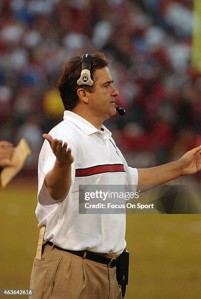 Head coach Steve Mariucci of the San Francisco 49ers looks on from the sidelines against the New York Giants during the NFC Wildcard game January 5,...