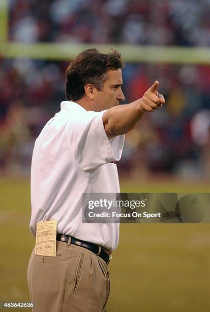 Head coach Steve Mariucci of the San Francisco 49ers looks on from the sidelines against the New York Giants during the NFC Wildcard game January 5,...