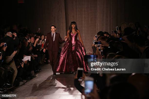 Designer Zac Posen and model Naomi Campbell walk the runway during the Zac Posen fashion show at Vanderbilt Hall at Grand Central Terminal on...