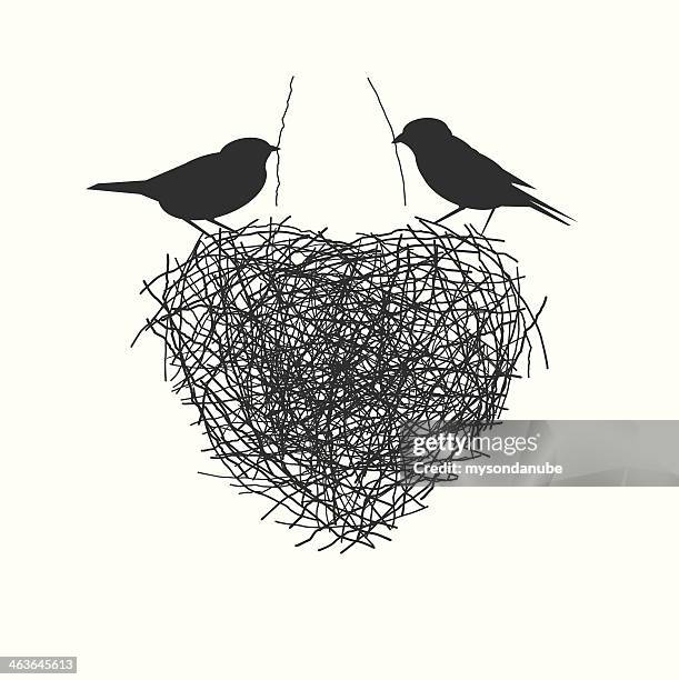 stockillustraties, clipart, cartoons en iconen met two birds making heir nest - work romance