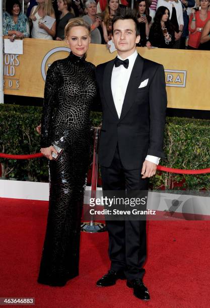 Actor Rupert Friend and Aimee Mullins attend the 20th Annual Screen Actors Guild Awards at The Shrine Auditorium on January 18, 2014 in Los Angeles,...