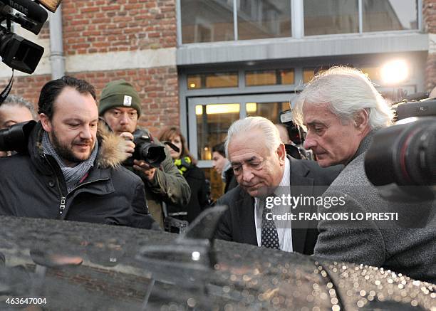 Former IMF chief Dominique Strauss-Kahn leaves his hotel on February 17 in the northern French city of Lille to attend a session on the third week of...