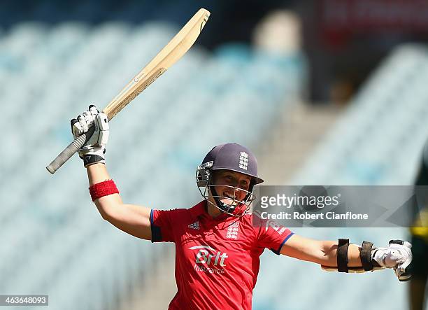 Arran Brindle of England celebrates as she scores the winning run to give England victory over Australia during game one of the women's One Day...