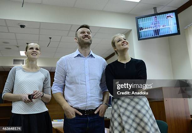 Russian anti-Kremlin opposition leader Alexei Navalny accompanied his wife Yulia Navalny and his brother's wife Victoria attend the action of...