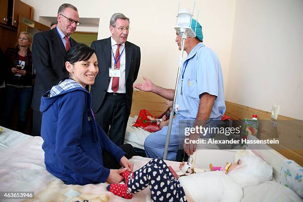 Doctor Klaus Exner talks to Karl Hopfner , President of Bayern Muenchen and Karl-Heinz Rummenigge, CEO of FC Bayern Muenchen as thei visits the...