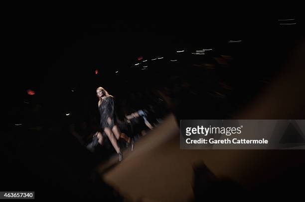 Model walks the runway at Naomi Campbell's Fashion For Relief Charity Fashion Show during Mercedes-Benz Fashion Week Fall 2015 at The Theatre at...