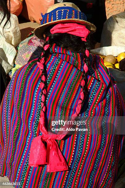 woman back wearing traditional clothing - guatemala stock-fotos und bilder