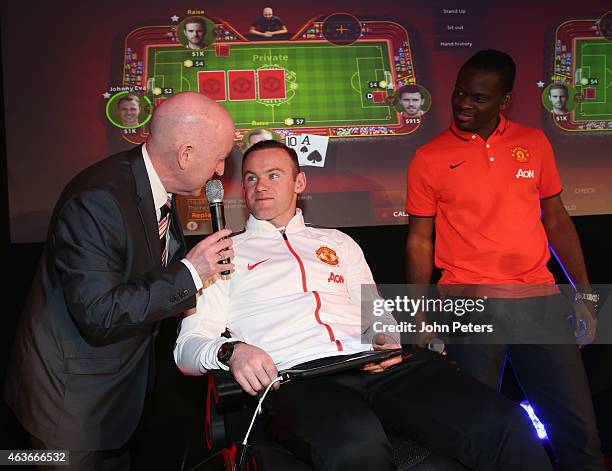 Wayne Rooney of Manchester United plays poker at a press conference to launch Manchester United's partnership with KamaGames and unveil the first in...