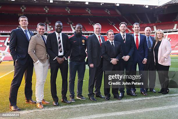 Head of Manchester United Marketing Jonathan Rigby and CEO of KamaGames Danny Hammet pose with representatives from both companies after a press...