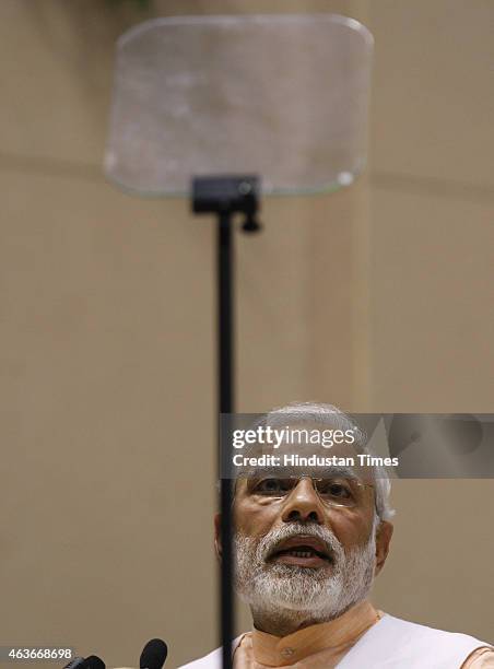 Prime Minister Narendra Modi using teleprompter during his speech at a function to celebrate the elevation of Kuriakose Elias Chavara and Mother...