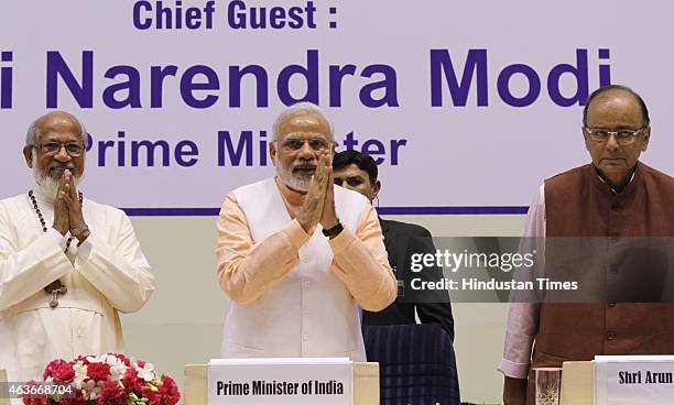 Prime Minister Narendra Modi and Finance Minister Arun Jaitley with Cardinal George Alencherry during a function to celebrate the elevation of...