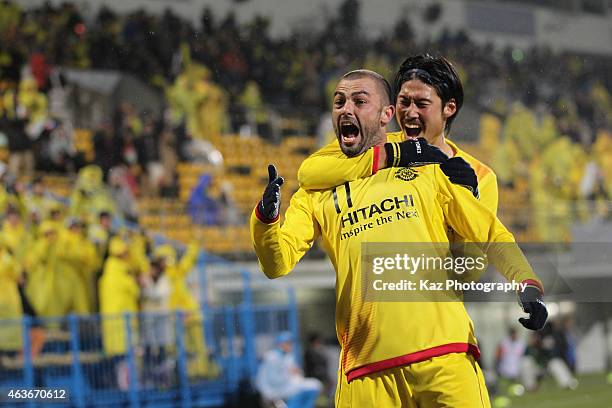 Leandro Montera Da Silva of Kashiwa Reysol celebrates his team's third goal with his team mate Daisuke Suzuki during the AFC Champions League...