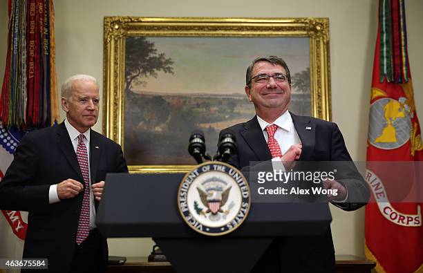 Ashton Carter takes the podium to give remarks after he was sworn in as U.S. Secretary of Defense by Vice President Joe Biden February 17, 2015 in...