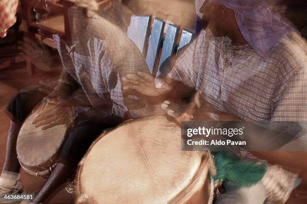 guatemala, livingston, playing drums - livingston guatemala stock pictures, royalty-free photos & images