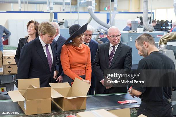 Queen Maxima of The Netherlands and King Willem-Alexander of The Netherlands visit the Wedeka social labour centre on February 17, 2015 in...