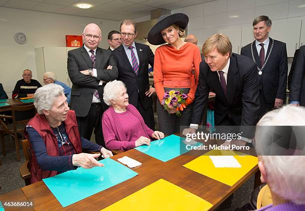 Queen Maxima of The Netherlands and King Willem-Alexander of The Netherlands visit the multi functional centre De Deele on February 17, 2015 in Emmer...