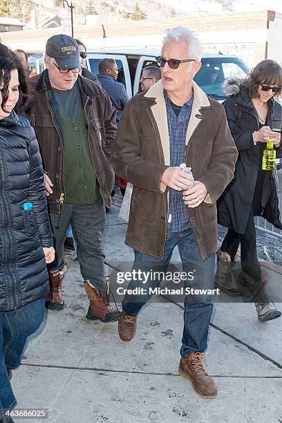 Actors Philip Seymour Hoffman and John Slattery attend Oakley Learn To Ride With AOL at Sundance on January 18, 2014 in Park City, Utah.