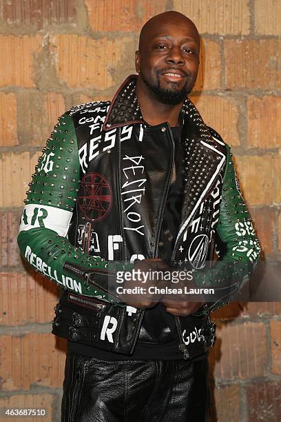 Rapper Wyclef Jean poses backstage at the Diesel Black Gold fashion show during Mercedes-Benz Fashion Week Fall 2015 on February 17, 2015 in New York...