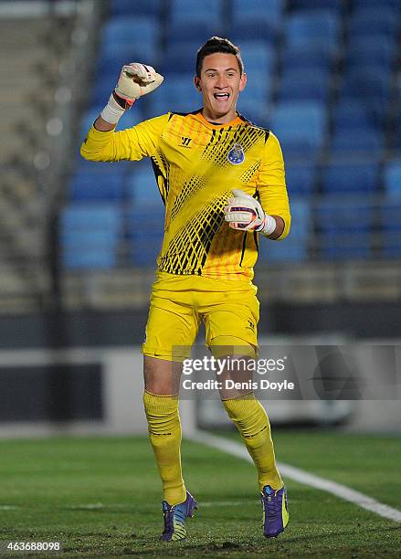 Raul Gudino of FC Porto reacts after saving a penalty to win the penalty shoot-out in the UEFA Youth League Round of 16 match between Real Madrid and...