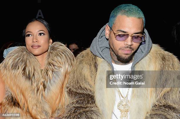 Karrueche Tran and Chris Brown attend the Michael Costello fashion show during Mercedes-Benz Fashion Week Fall 2015 at The Salon at Lincoln Center on...